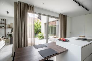Multibat strakke villa in betonlook Multibat strakke villa in betonlook